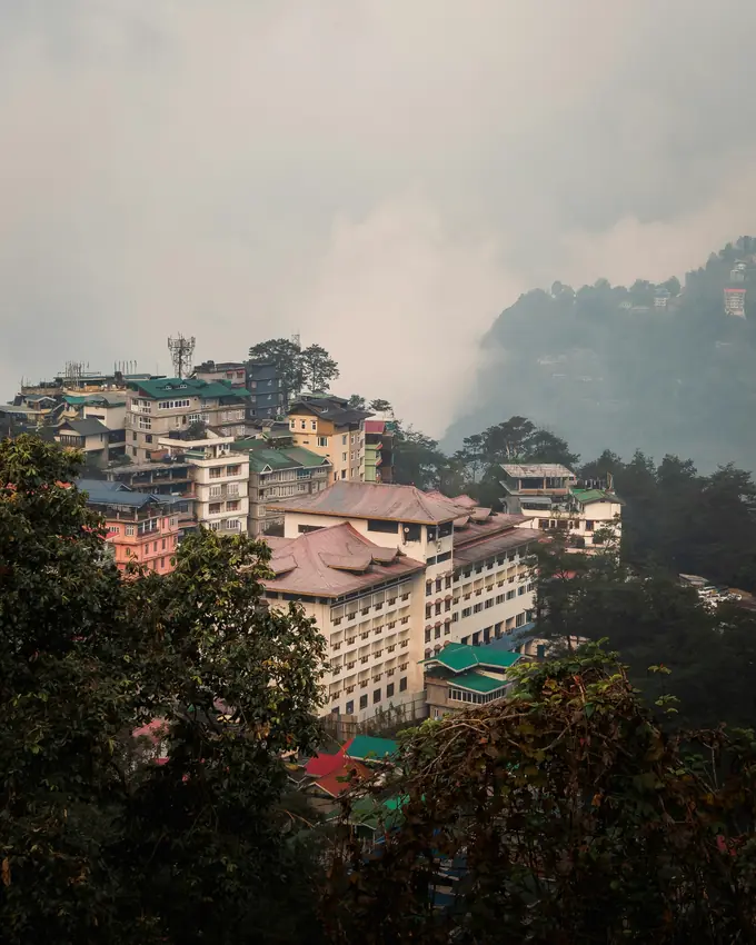 Gangtok town on a misty hillside
